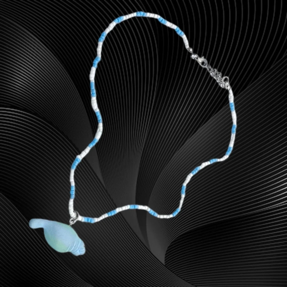 Blue and White Beaded Necklace with Manetee Pendant